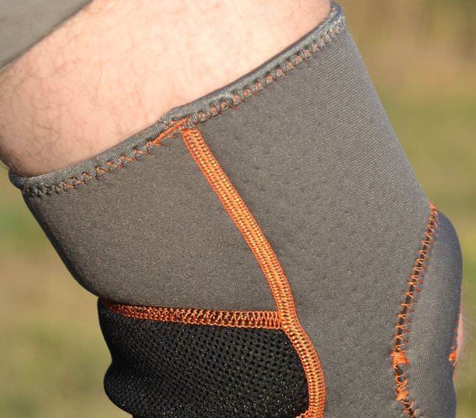 Наколінник MadMax MFA-297 Knee Support with Patella Stabilizer Dark Grey/Orange M MFA-297_M фото
